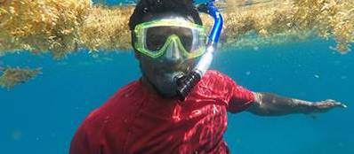 Marine science student underwater snorkeling.