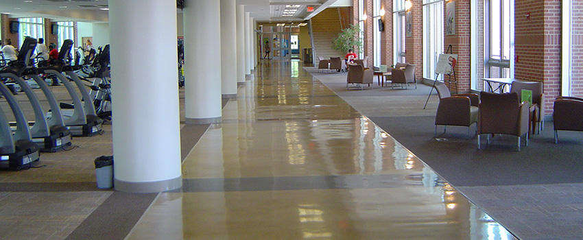 Inside of Campus Recreation walkway in front of machines.