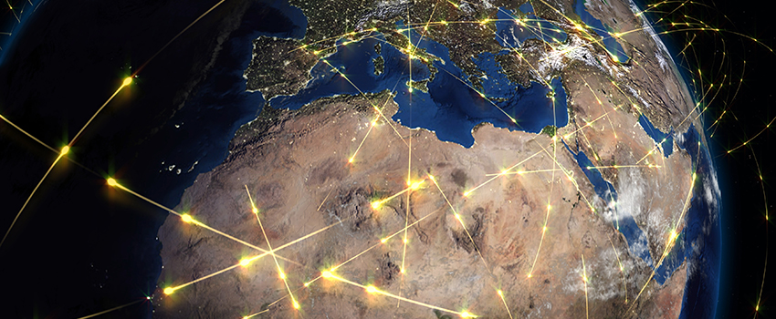 picture of globe with trade routes traced