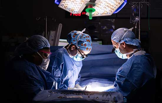 USA Health Care workers in surgery.